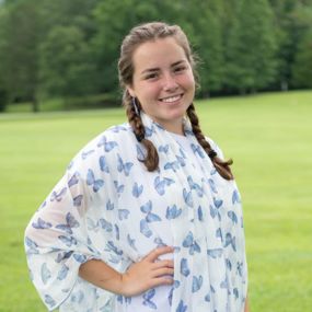 Emily Day wearing regalia