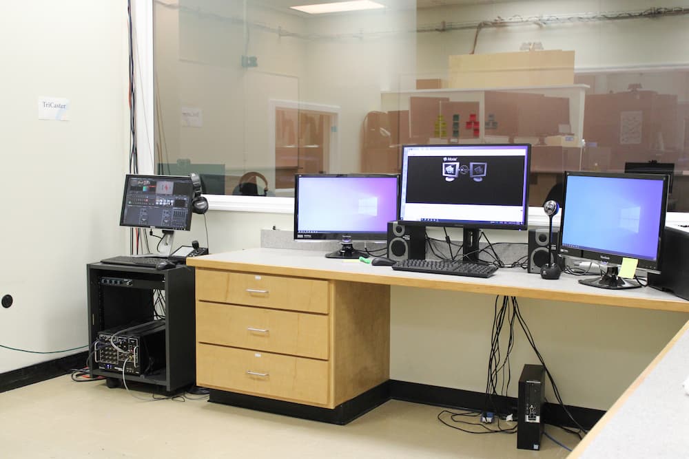 A photo of the LUCIA lab's control room, 1204, where the LUCIA team works during usability testing. 