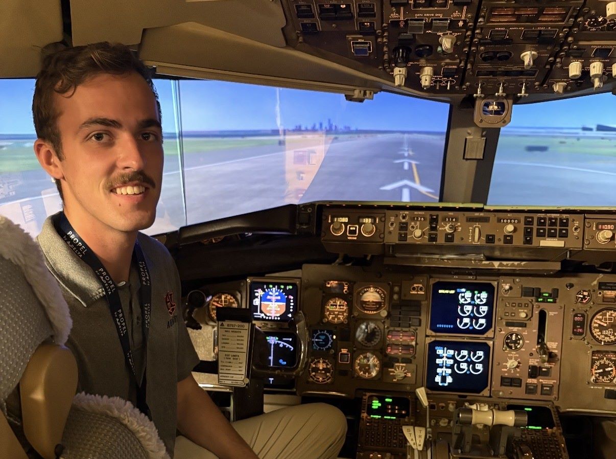 Rex Fowler in the flight deck of a plane