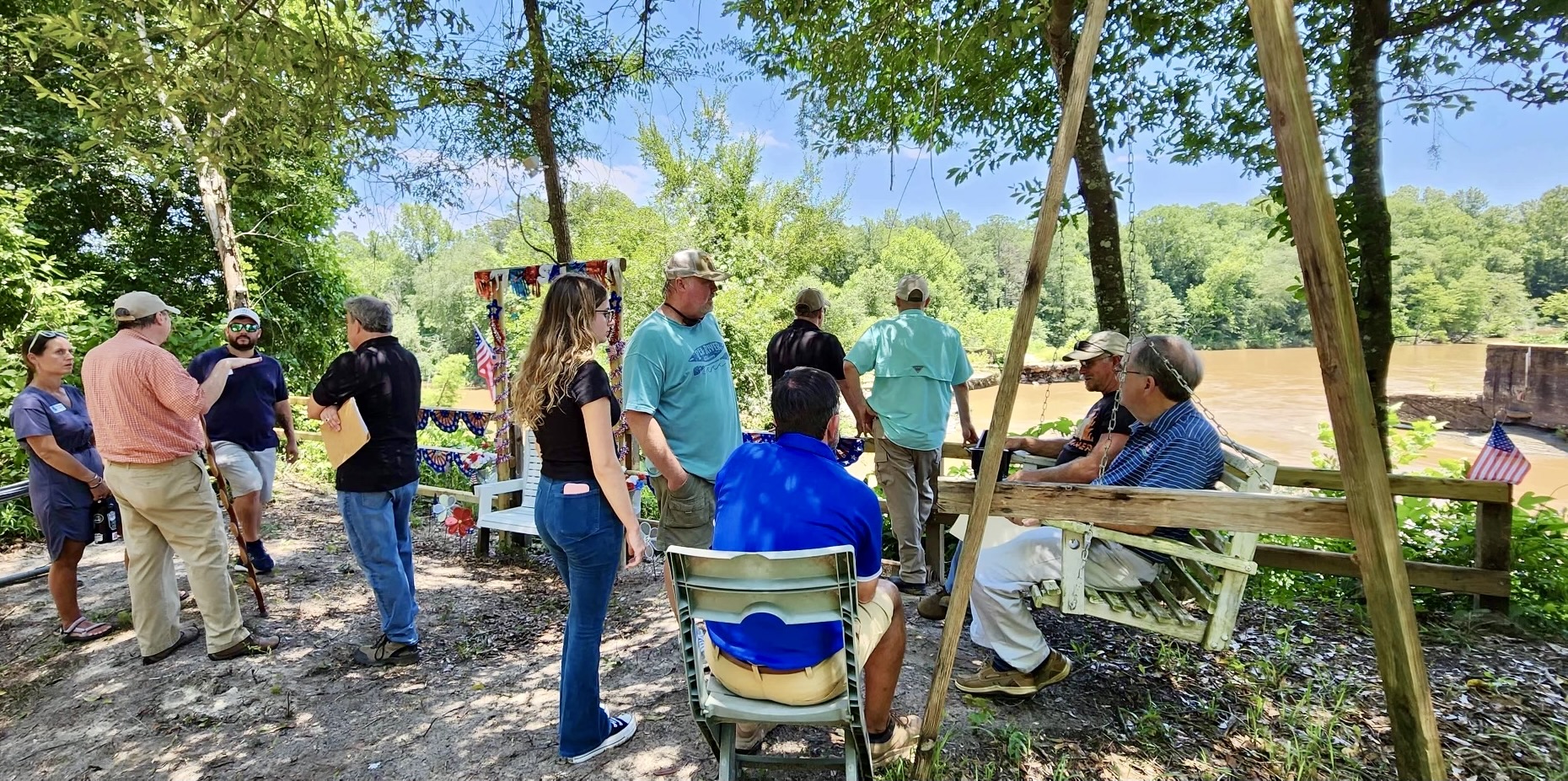 Community members gather to discuss the Elba Dam