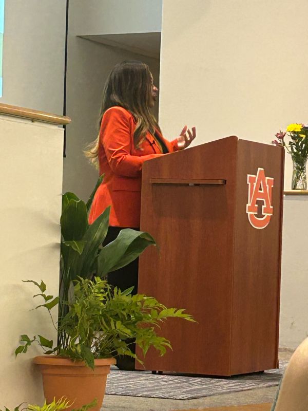 Catherine Flowers speaking at a podium