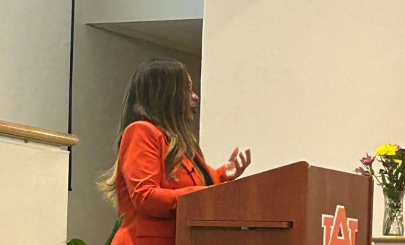 Catherine Flowers speaking at a podium