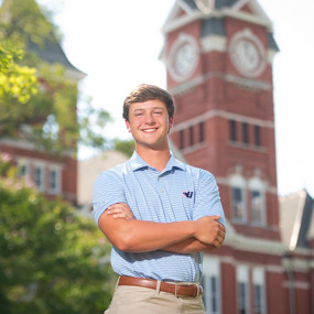 Jake Haston stands in front of Samford Hall