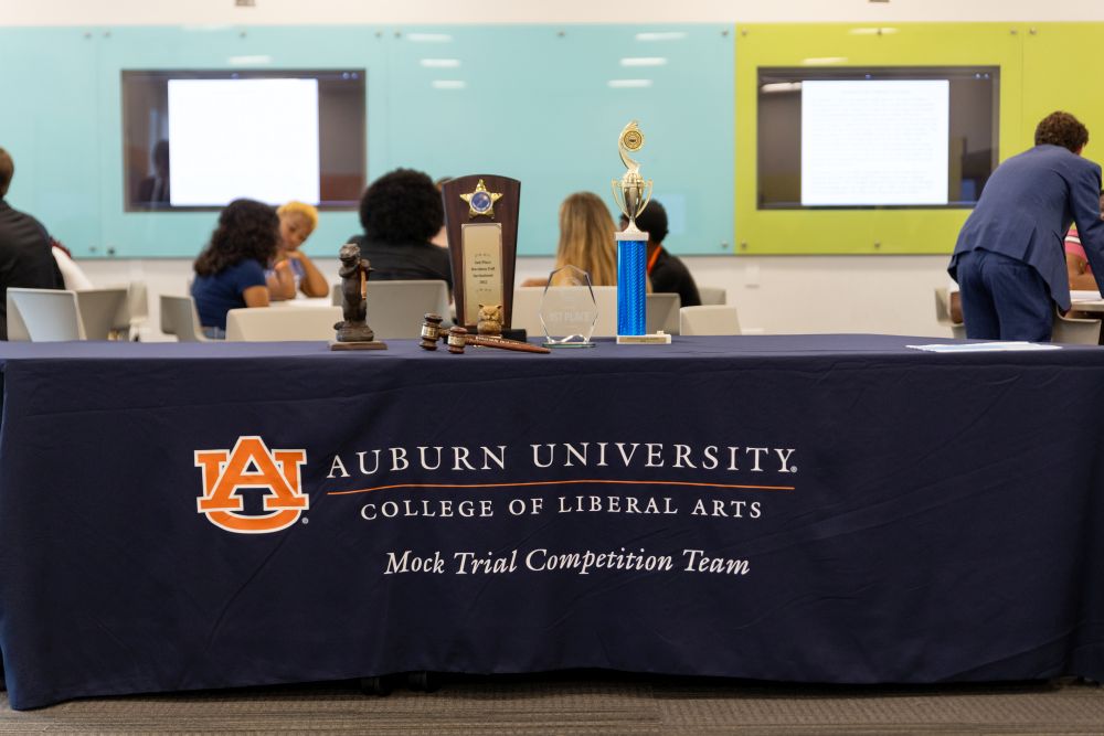 Mock Competition Team table with three trophies 