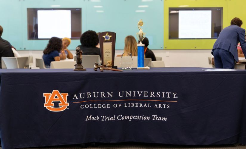 Mock Competition Team table with three trophies 