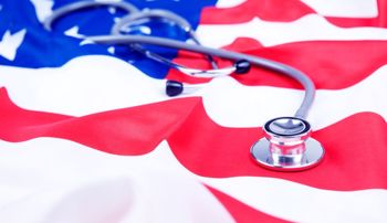 A stethoscope lying on an American flag