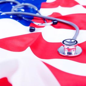 A stethoscope lying on an American flag