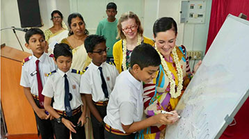 Almuna with students in India