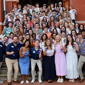 Camp War Eagle student leaders pose for a photo on the steps of Samford Hall