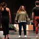 Adrienne Wilson instructing dancers on stage