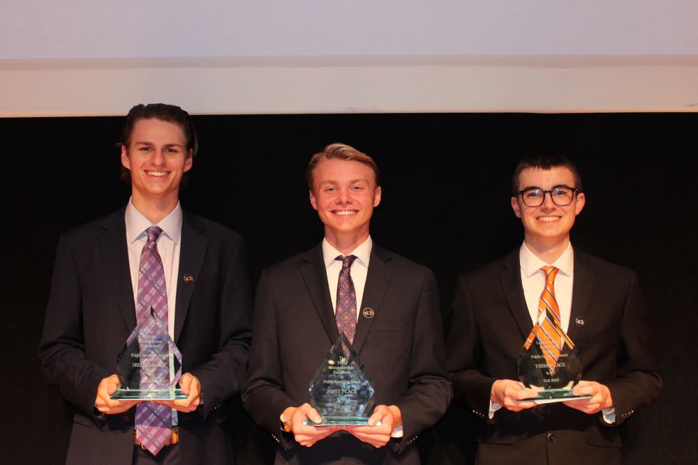 Walter Reed, Dalton Dismukes and Seth Riley with Auburn Speaks awards