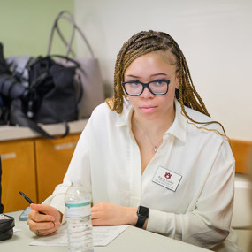 Student taking notes