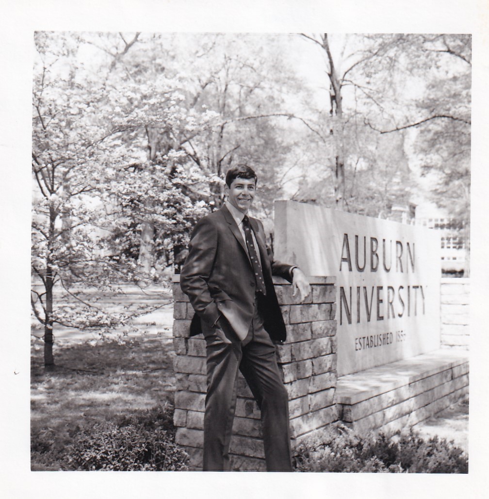 A young Bill Lee standing at the Auburn University sign in 1970