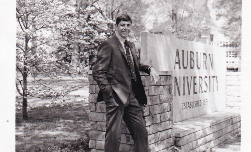 A young Bill Lee standing at the Auburn University sign in 1970