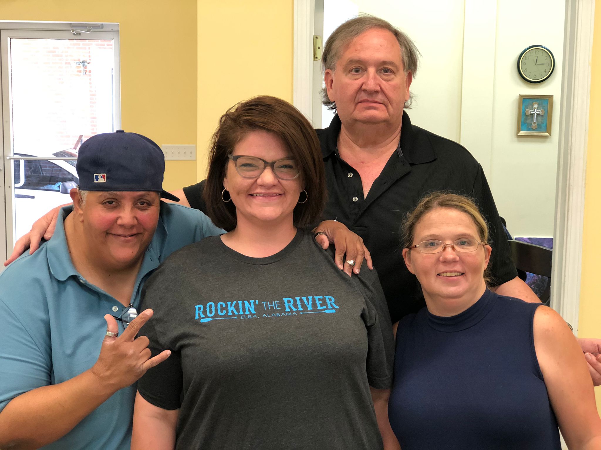 Founr people standing together