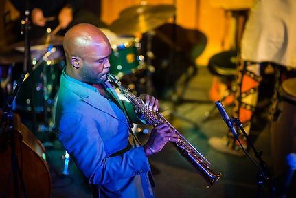 Khari Allen Lee playing a clarinet