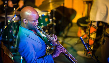 Khari Allen Lee playing a clarinet