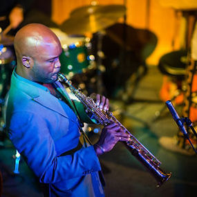 Khari Allen Lee playing a clarinet