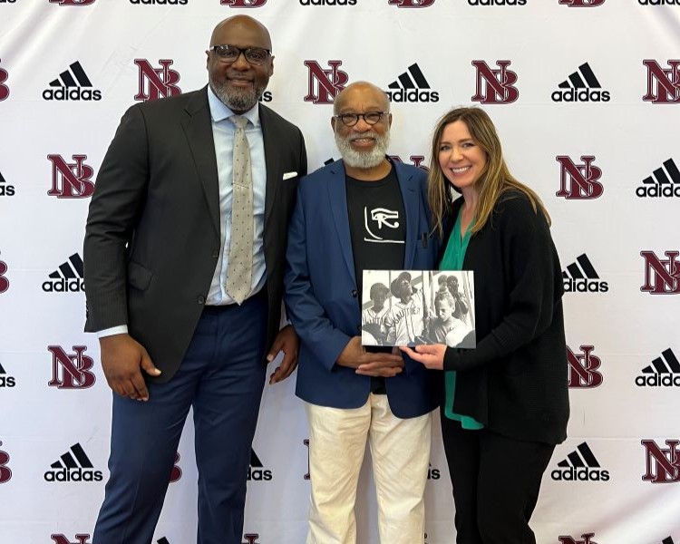 Chester Higgins posing for photo at New Brockton High School
