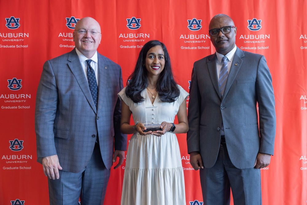 Nadia Bhuiyan accepting a 2026 Outstanding Graduate Mentor Award