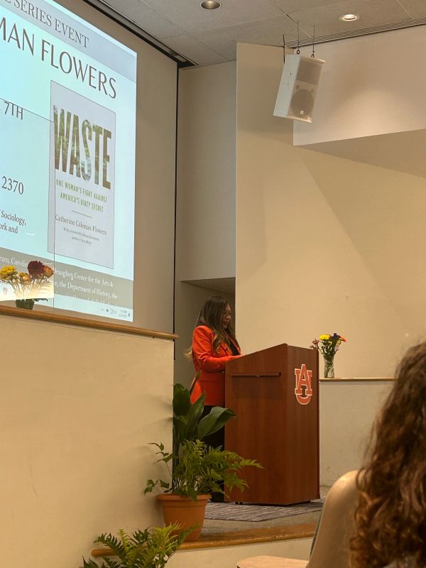 Catherine Flowers speaking at a podium