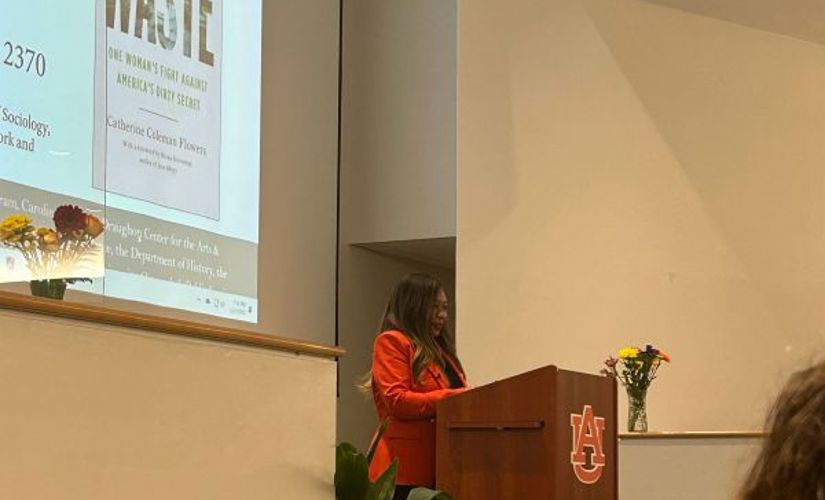 Catherine Flowers speaking at a podium