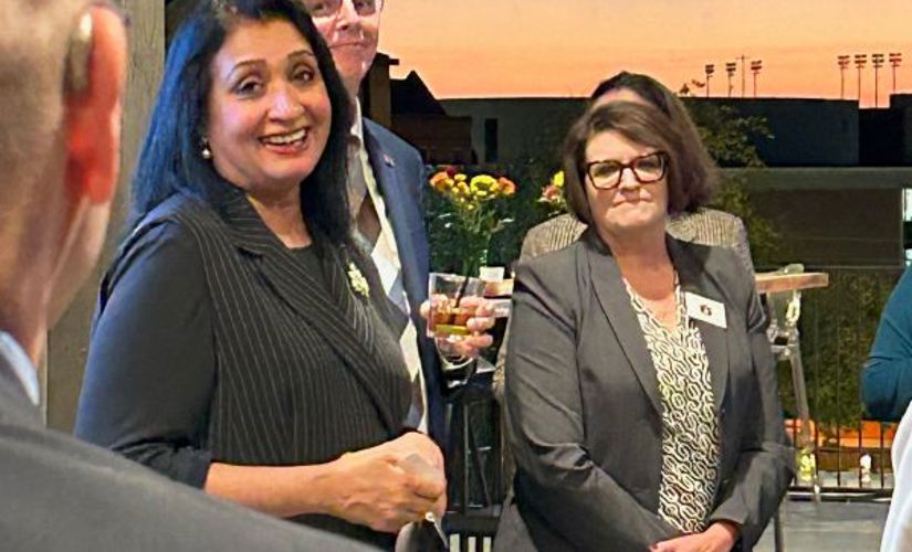 People standing  on a balcony
