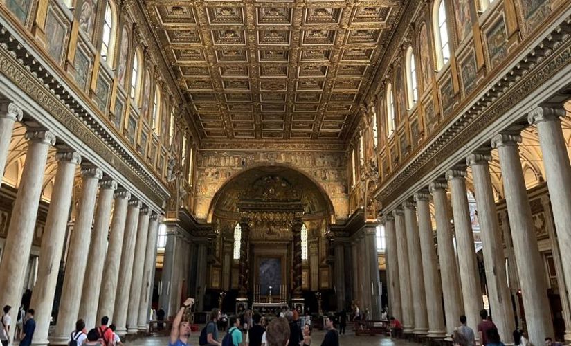 Museum entrance with gold ceiling and columns