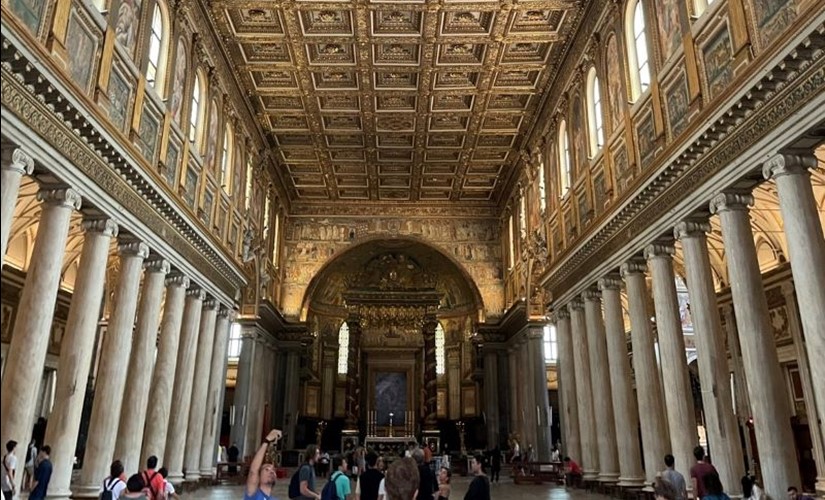 Museum entrance with gold ceiling and columns