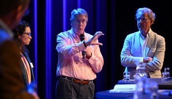 John Morris speaking during a panel at the University of Twente