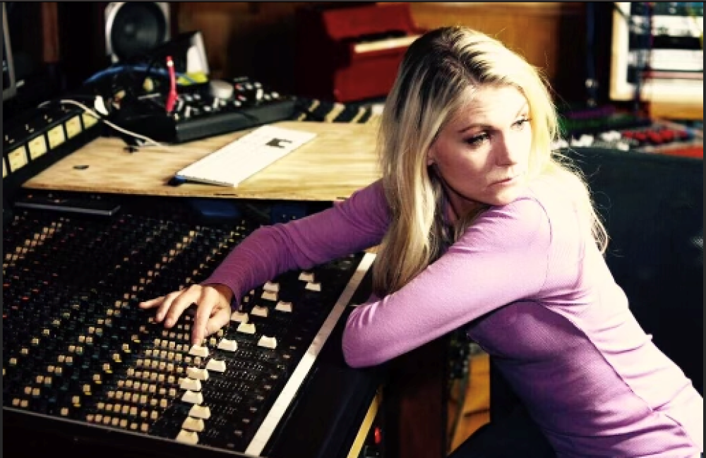 Kate Higgins at a soundboard