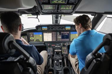 Student working on the wing of a plane