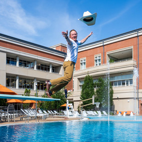 Eric Smith jumping into a swimming pool