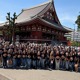 Large group of students standing in front of a building in Japan