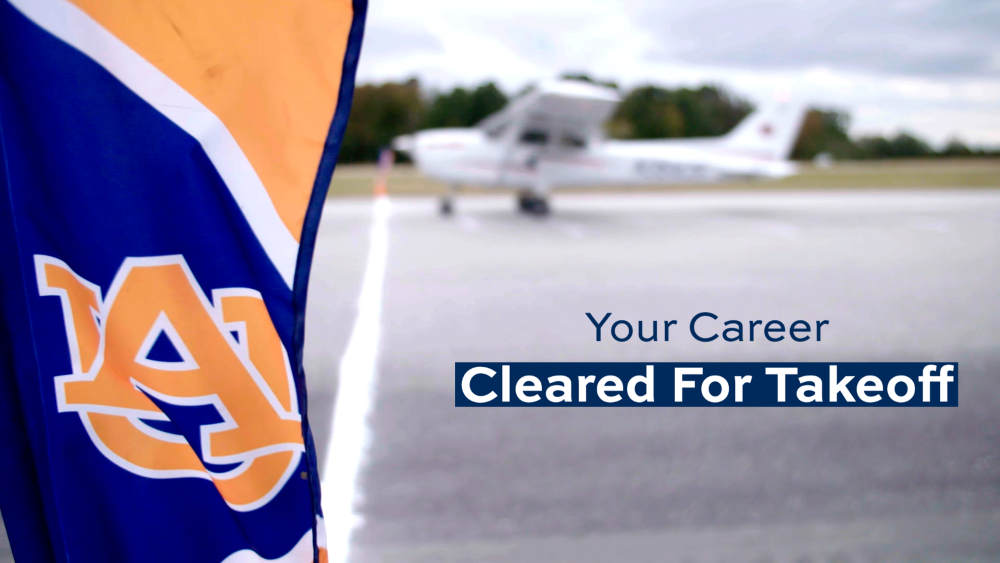 Auburn flag at Auburn University Airport with text reading Your Career Cleared for Takeoff