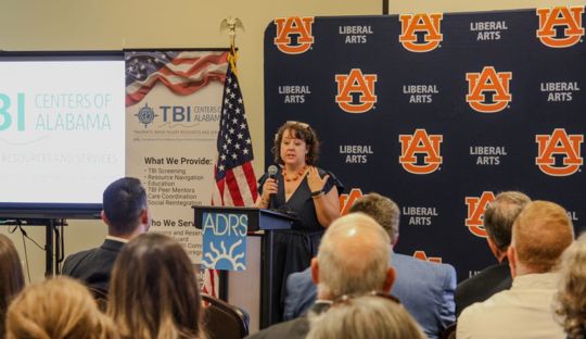 Danilea Werner delivering a speech at the TBI Center ribbon cutting