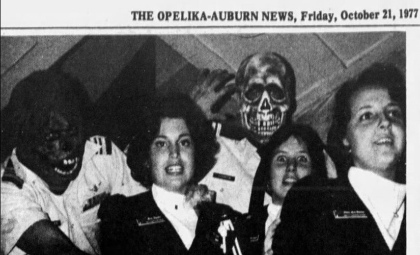 Newspaper article showing Auburn student organizers testing the haunted house