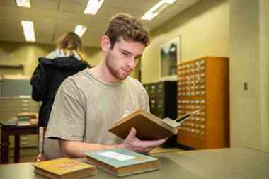 Student reading a book
