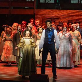 The cast of Sweeney Todd performing onstage during dress rehearsal