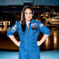 Kiah Erlich wearing a blue flight suit