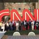 Group of students standing in front of CNN sign