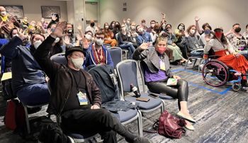 Big Bad Con attendees waving to the camera