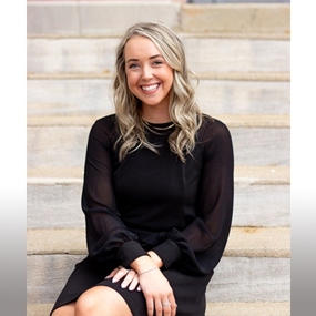 Hannah McGill sitting on steps