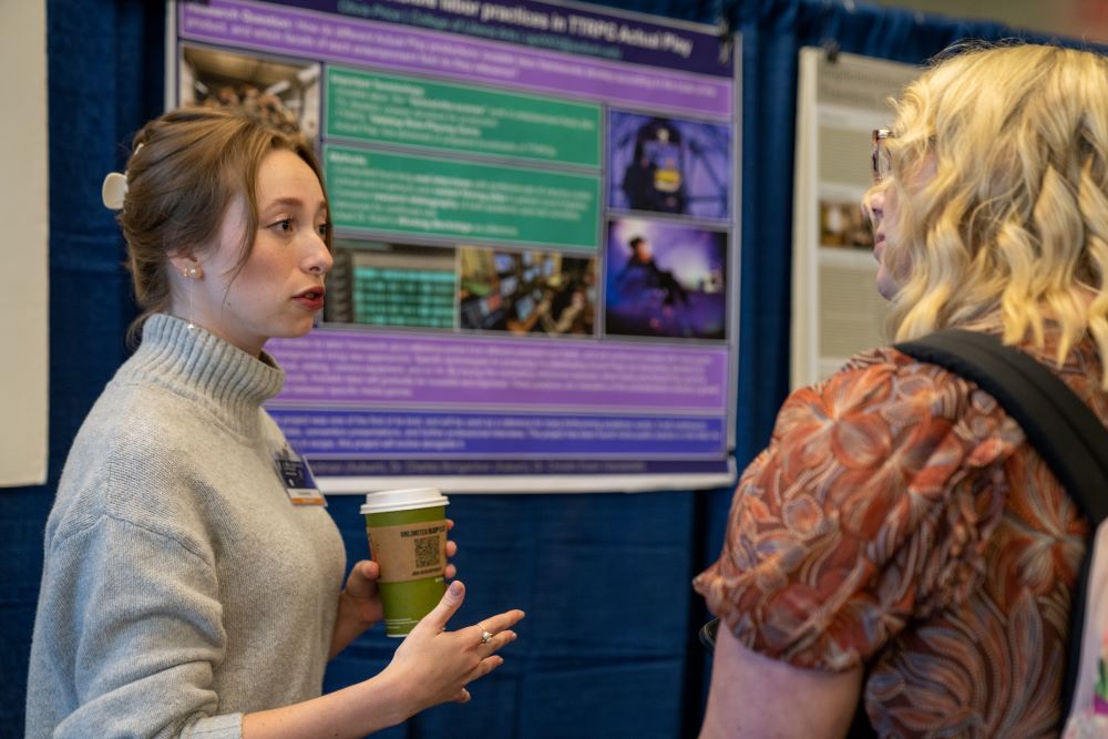 Olivia Price presents her research at the syposium