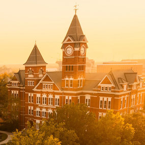 Samford Hall and lawn at sunset