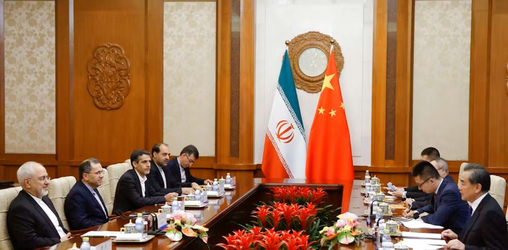 Chinese diplomats meeting at a conference room