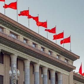 Red banners atop the National People's Congress in Beijing, China