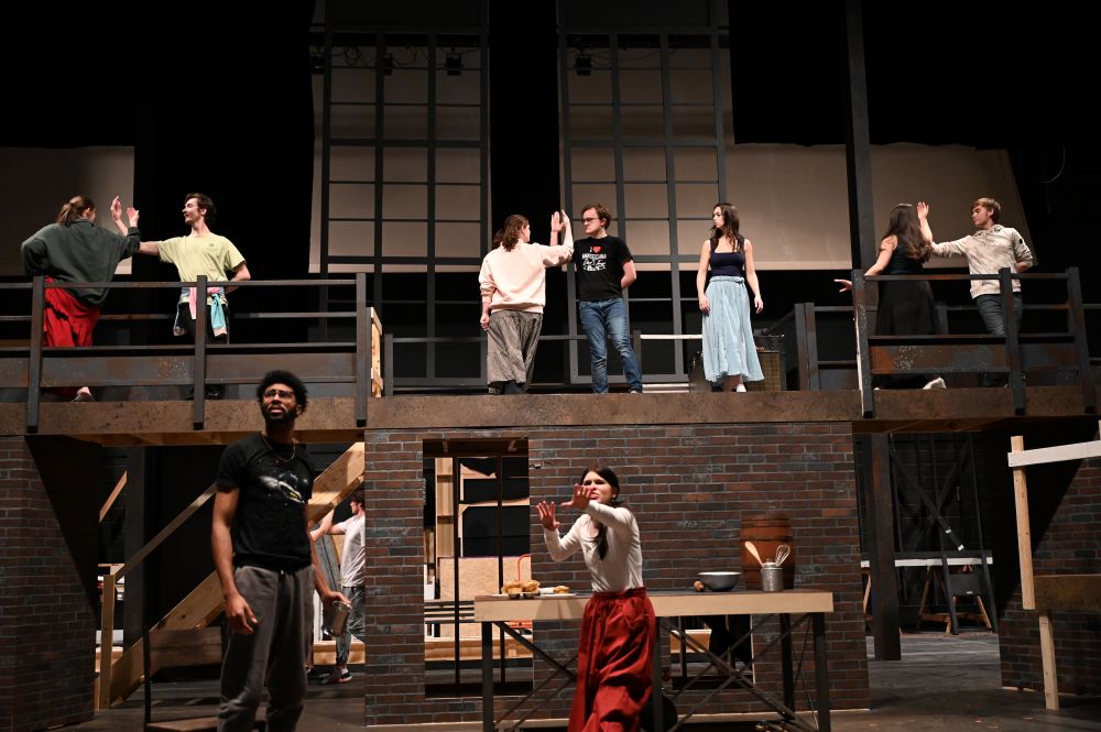 Student actors rehearsing a scene from Sweeney Todd