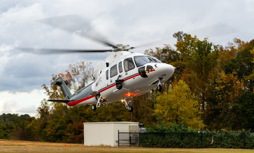 helicopter landing on a pad