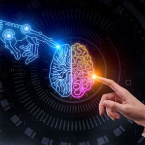 A drawing of a human brain in the center, with a human hand touching its right side and an artificial, computerized hand touching its left side